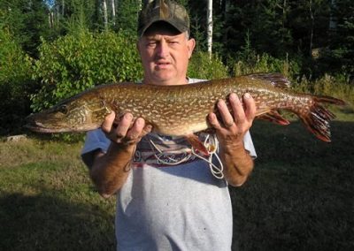 decent northern pike guy holding